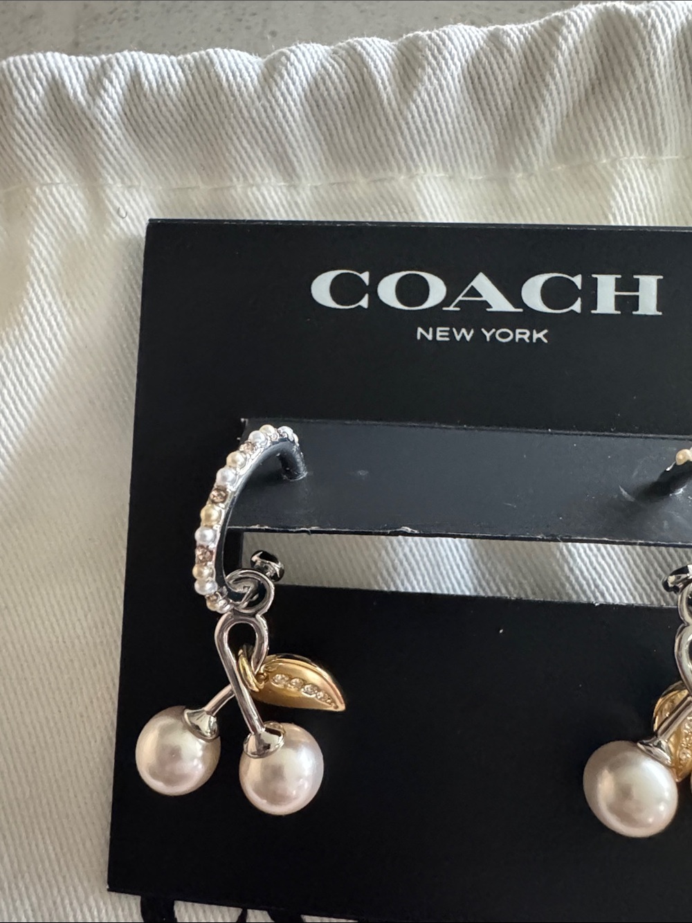COACH Two-Tone Pearl Drop Hoop Earrings with Gold Leaf Accents - Picture 4 of 6